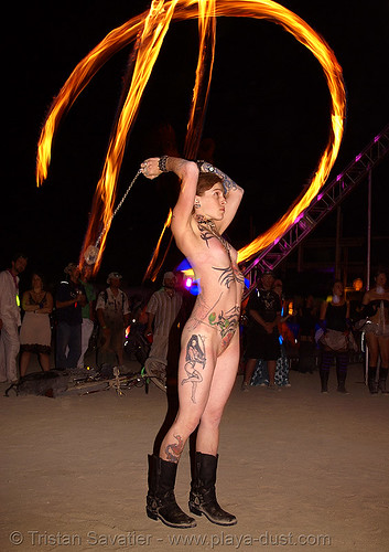Leah spinning fire poi - Tattoos - Girl - burning man 2007
