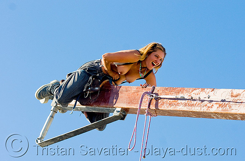 Tina on giant teeter-totter - Topless girl - burning man 2008