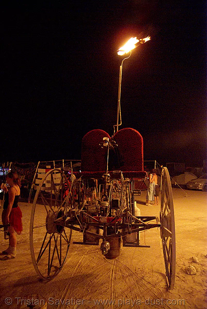department of spontaneous combustion - burning man 2007, art car, burning man car, burning man festival, dsc, fire tricycle, fire trike, night, three wheeler, stock photo