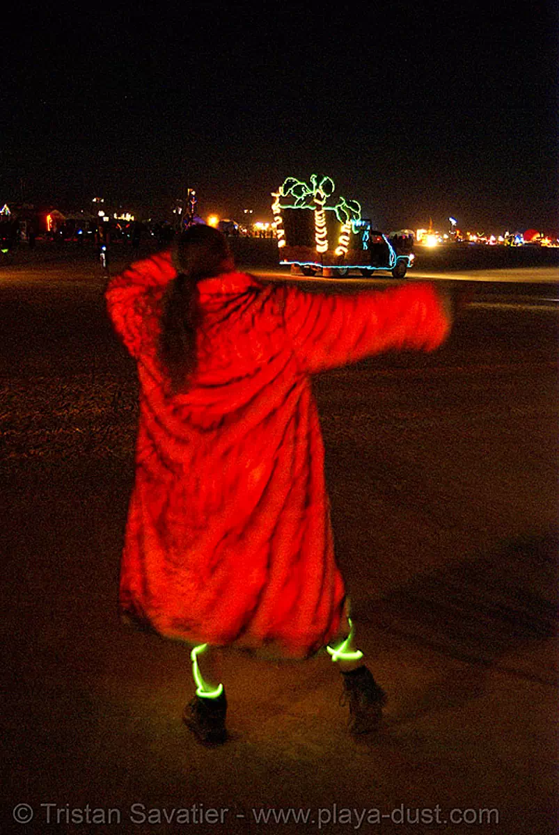 glowing fur coat - burning man 2007, burning man festival, glowfur, night, red, stock photo