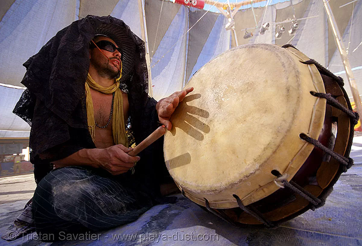 drummer - burning man 2007, burning man festival, center camp, drum, stock photo