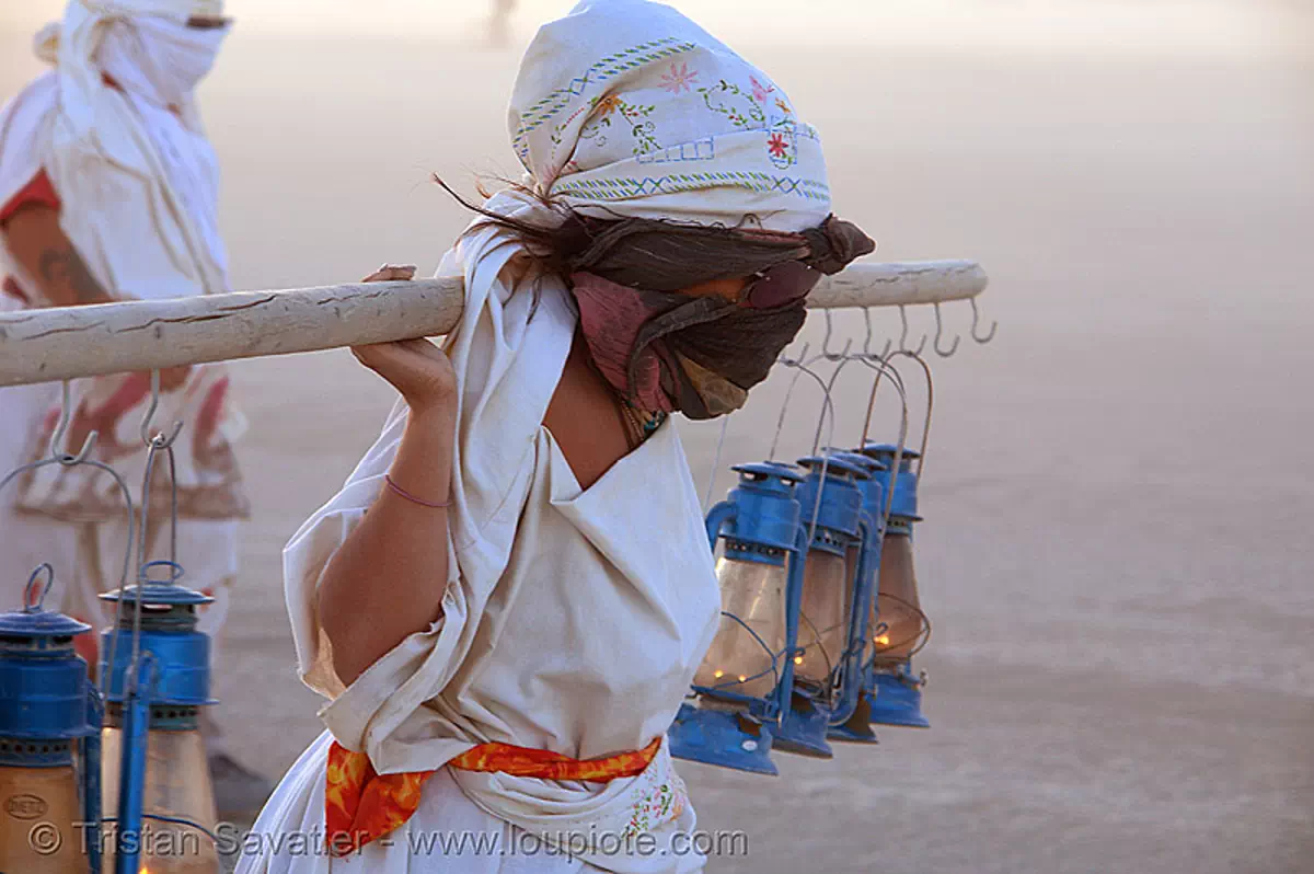 the lamplighters - burning-man 2006, art, burning man festival, march, petrol lanterns, procession, stock photo