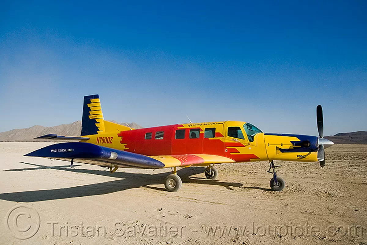 PAC 750XL, aircraft, burning man festival, burning sky, pac 750, pacific aerospace corporation, parked, red, skydiving, small plane, turbo prop, yellow, stock photo