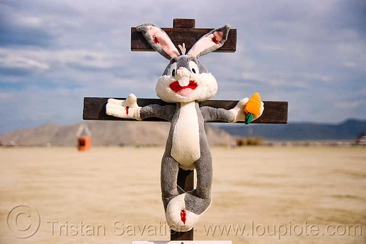 easter bunny on cross, animal cruelty, art installation, blasphemous, blasphemy, bugs bunny, burning man festival, carrot, corpus, crucified, crucifix, jesus christ, nailed, plush, stuffed animal, stuffed bunny, stuffed rabbit, unidentified art, stock photo