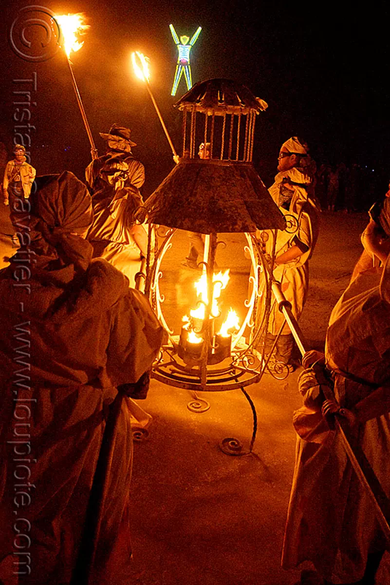 procession ceremonial flame - burning man 2009, burning man festival, fire, night of the burn, stock photo