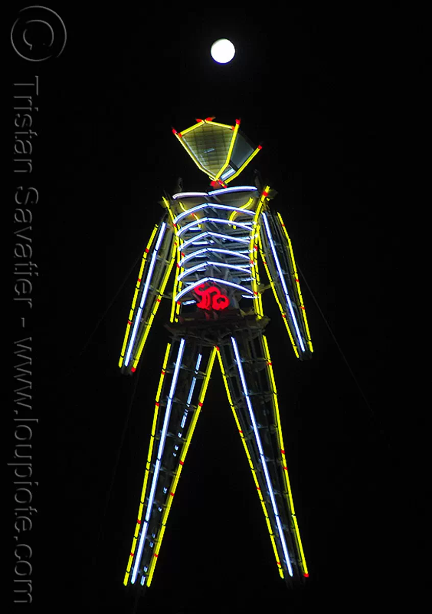the man under the full moon - burning man 2009, burning man festival, neon, night, yellow, stock photo