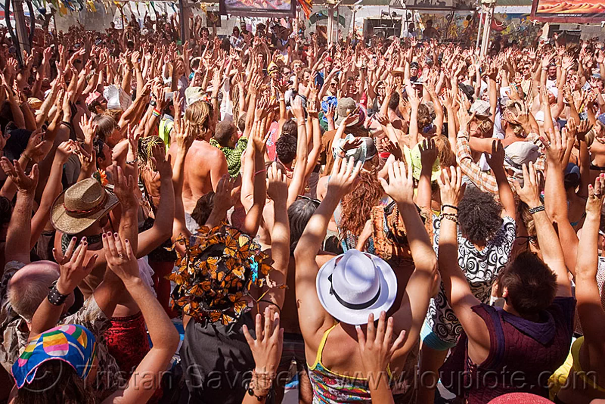 bali monkey chant - burning man 2010, burning man festival, center camp, crowd, hands up, kecak, ketjak, raised hands, stock photo