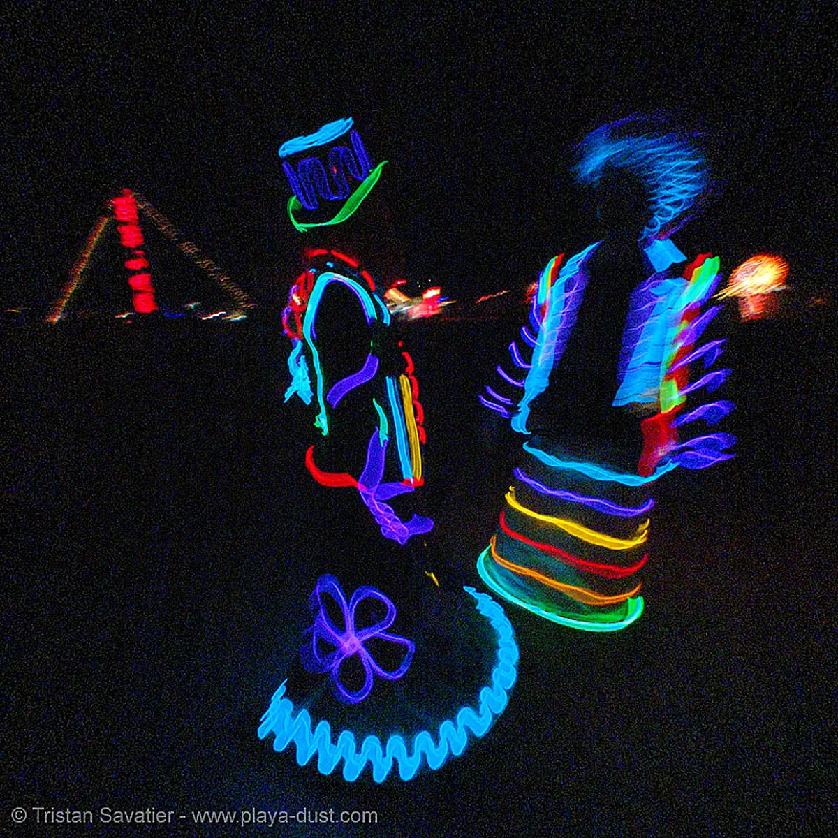 EL-wire couple - burning-man 2005, art, burning man festival, el-wire costumes, electroluminescent wire, night, stock photo