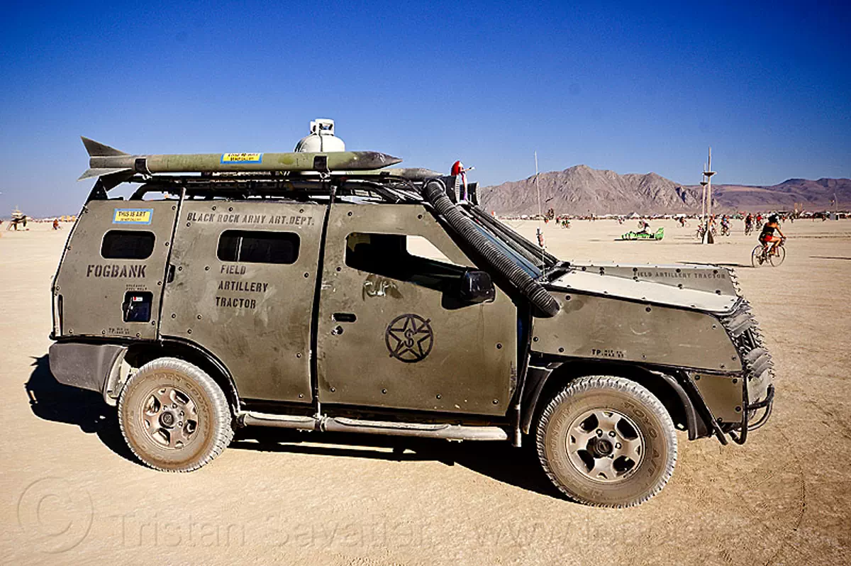 black rock army art dept armored car - burning man 2012, 911, armoured, art car, burning man festival, military, signs, stencil, vehicle, stock photo
