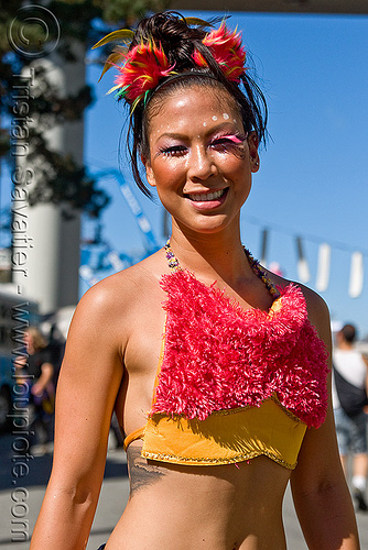 tattoo young asian woman with fuzzy costume Burning Man Decompression