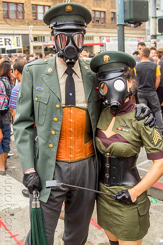 couple in military uniform fetish costume - gas masks, army, bondage, corset, costumes, fetish, gas masks, leather gloves, man, mask, masked, military cap, military hat, soldiers, uniform, whips, woman