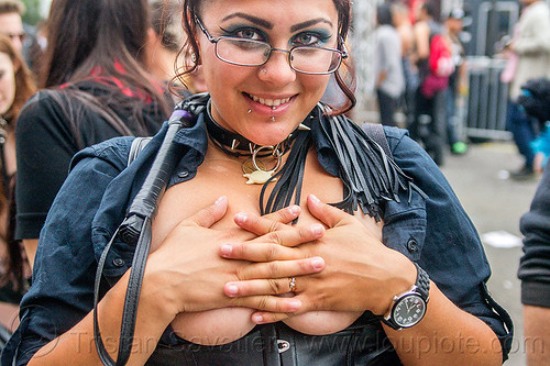 topless woman trying to hide breasts, emma, lip piercing, prescription glasses, spectacles, underboops, whip, woman