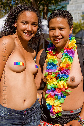 two topless girls with rainbow colors - gay pride (san francisco), gay pride festival, rainbow colors, rainbow flower necklace, topless, women