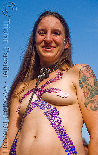 woman with purple bindis - folsom street fair 2009 (san francisco), arm tattoo, bindis, flower tattoo, pasties, purple, tattooed, topless, woman