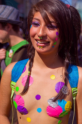 young woman with color pasties - how weird street faire (san francisco), color pasties, color polka dots, devin, lip piercing, nose piercing, rainbow pasties, rainbow polka dots, septum piercing, woman
