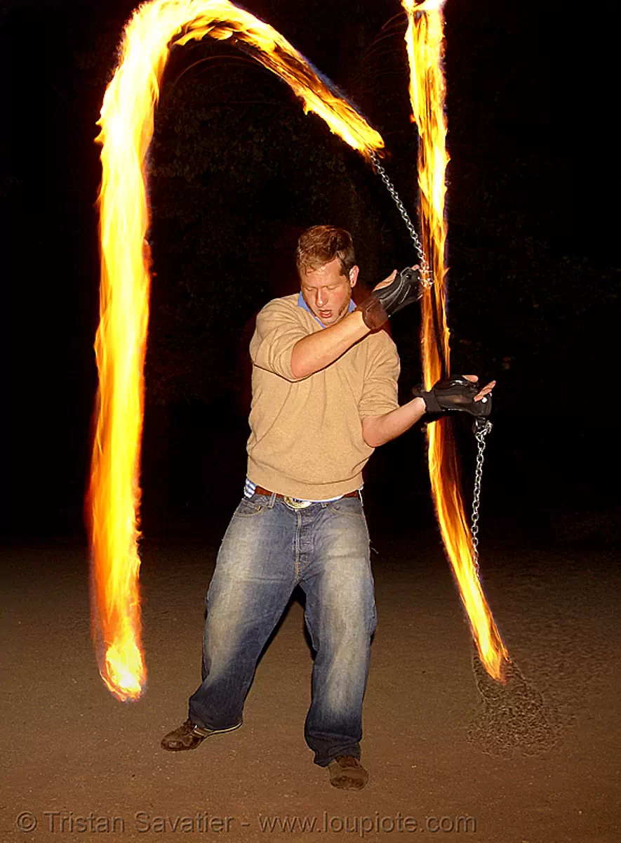 spinning fire poi (san francisco), fire dancer, fire dancing, fire performer, fire spinning, flame, long exposure, night, stock photo