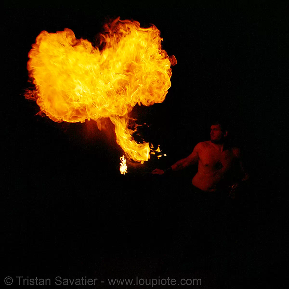 eric breathing fire (san francisco), fire breather, fire breathing, fire eater, fire eating, flame, night, stock photo