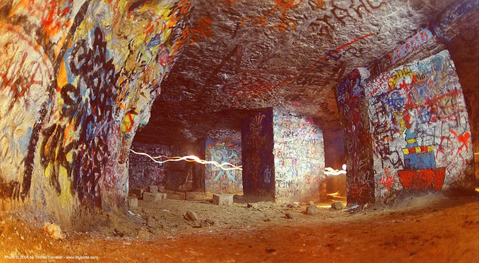 catacombes de paris - catacombs of paris (off-limit area) - la plage, cave, fisheye, graffiti, long exposure, trespassing, underground quarry, stock photo