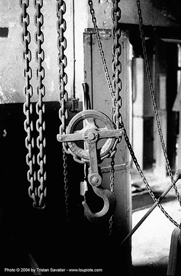 chain pulley - grands moulins de paris - chaines, abandoned, decay, hook, industrial mill, trespassing, urban exploration, stock photo