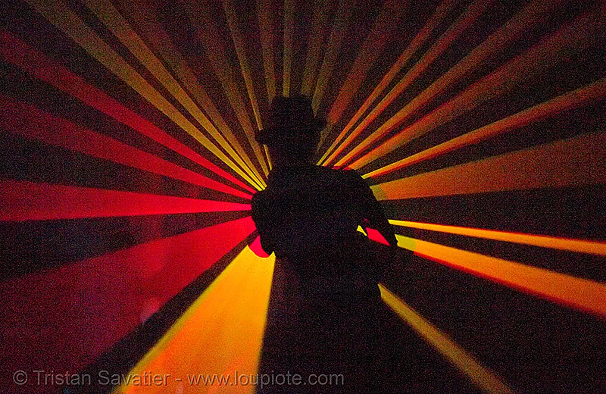 laser show - shadow with hat in warehouse underground rave party, backlight, lasers, nightclub, nightlife, rave lights, ravers, shadows, silhouettes, underground party, warehouse party, stock photo