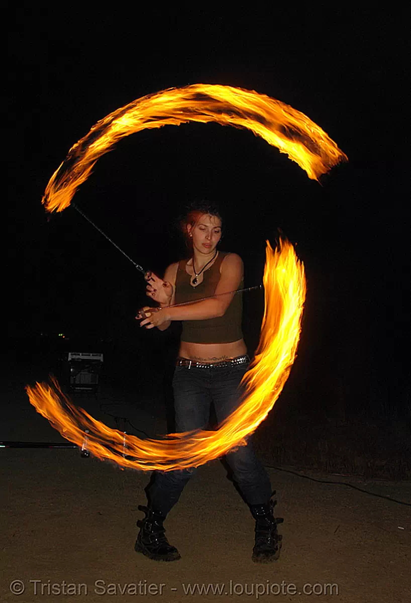 lexie spinning fire poi, fire dancer, fire dancing, fire performer, fire spinning, flame, long exposure, night, stock photo