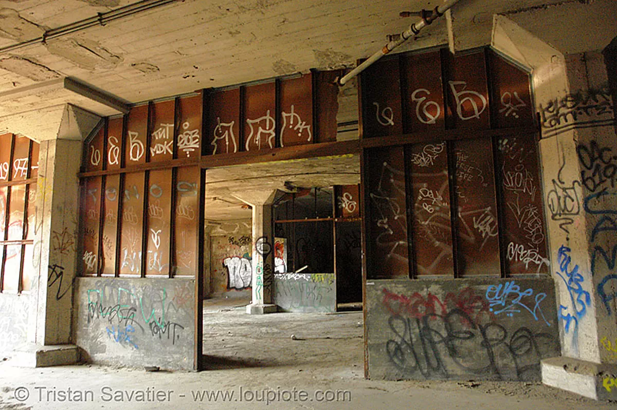 graffiti on rusty walls - abandoned factory (san francisco), derelict, industrial, rusted, street art, tags, tie's warehouse, trespassing, stock photo