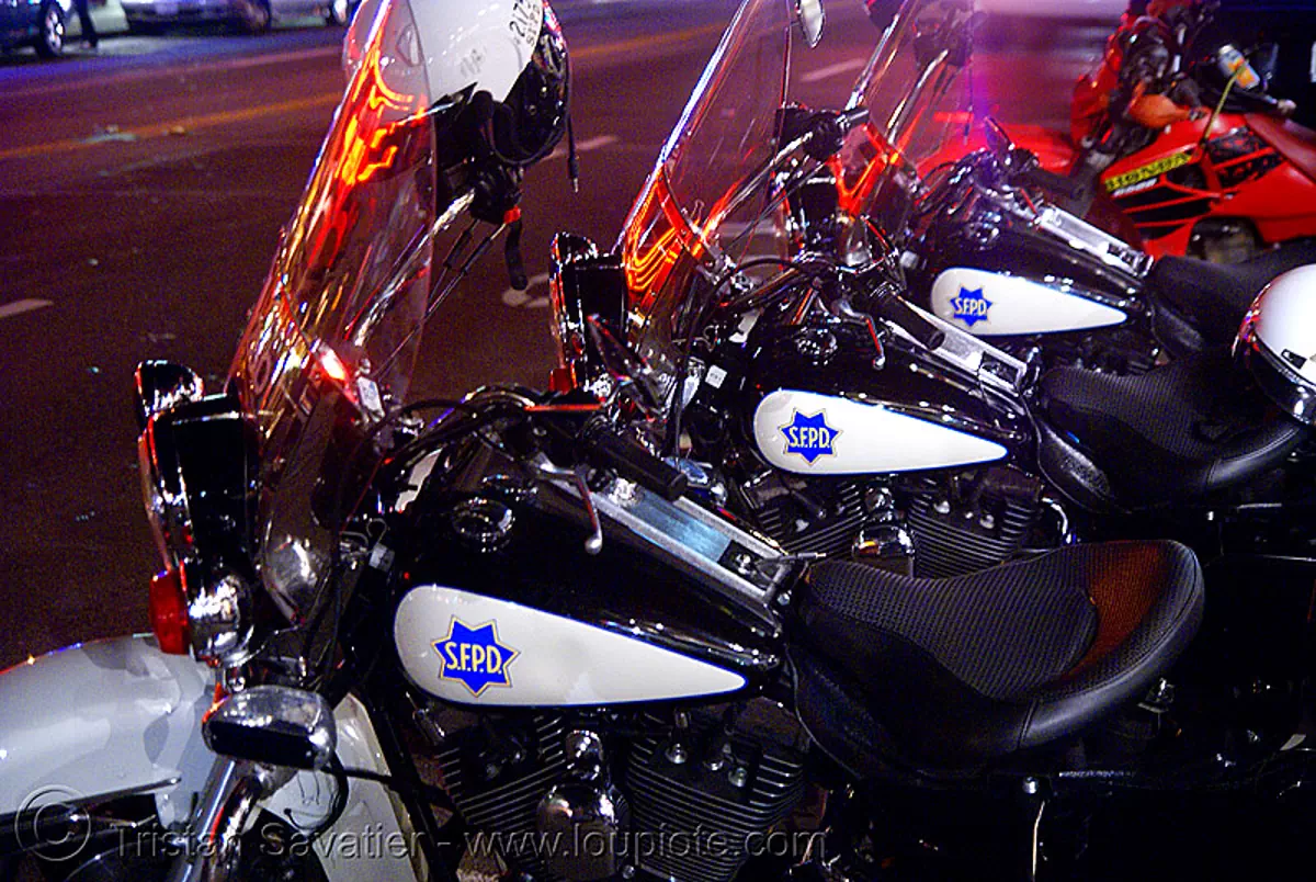 police motorcycles - SFPD  (san francisco), cops, harley-davidson, motorbikes, motorcycle police, night, parked, san francisco police department, street, stock photo