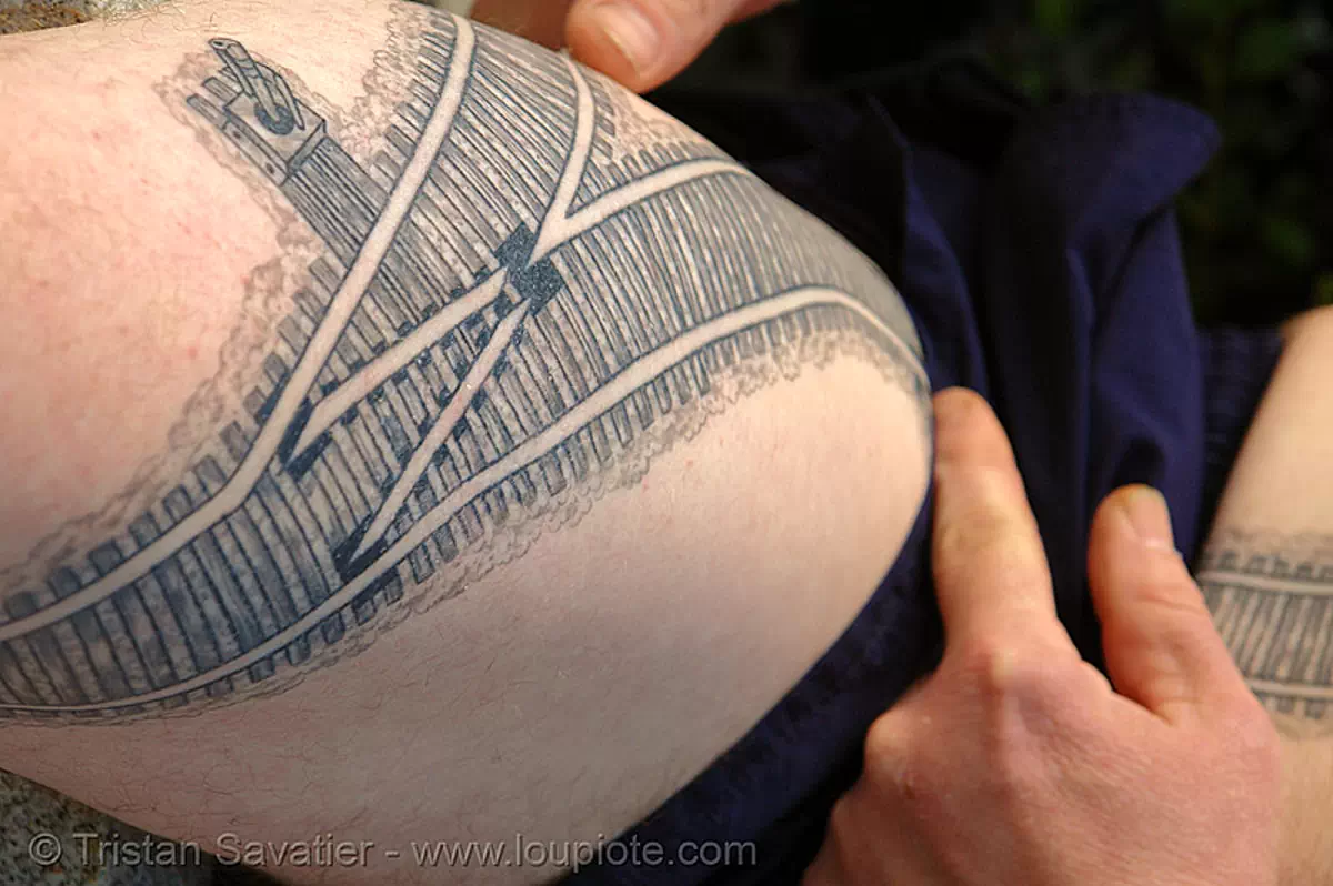 railroad tattoo - rails switch - thigh, darryl, freight hopping, full body tattoos, leg, rail tracks, railroad switch, railroad tracks, railway, skin, tattooed, train tracks, train tunnel, stock photo