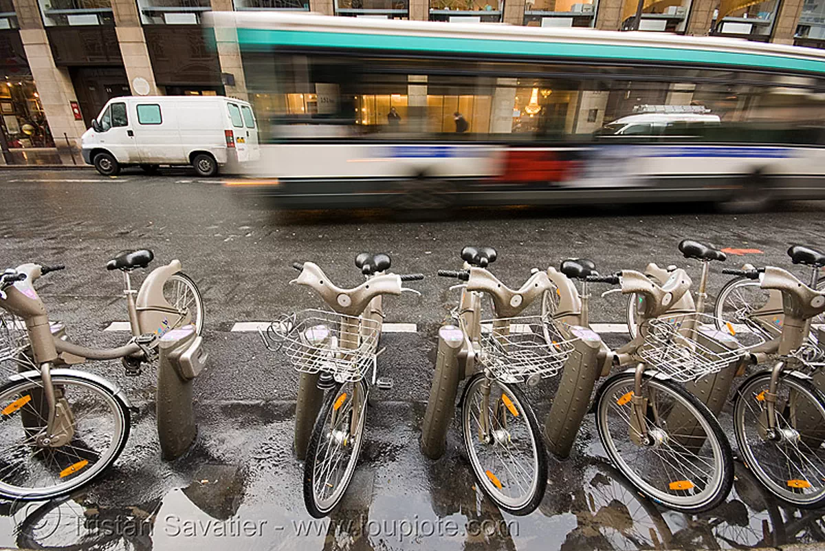 V&eacute;lib' bicycles and bus (paris), bikes, rental, station, velib, v&eacute;lib, stock photo