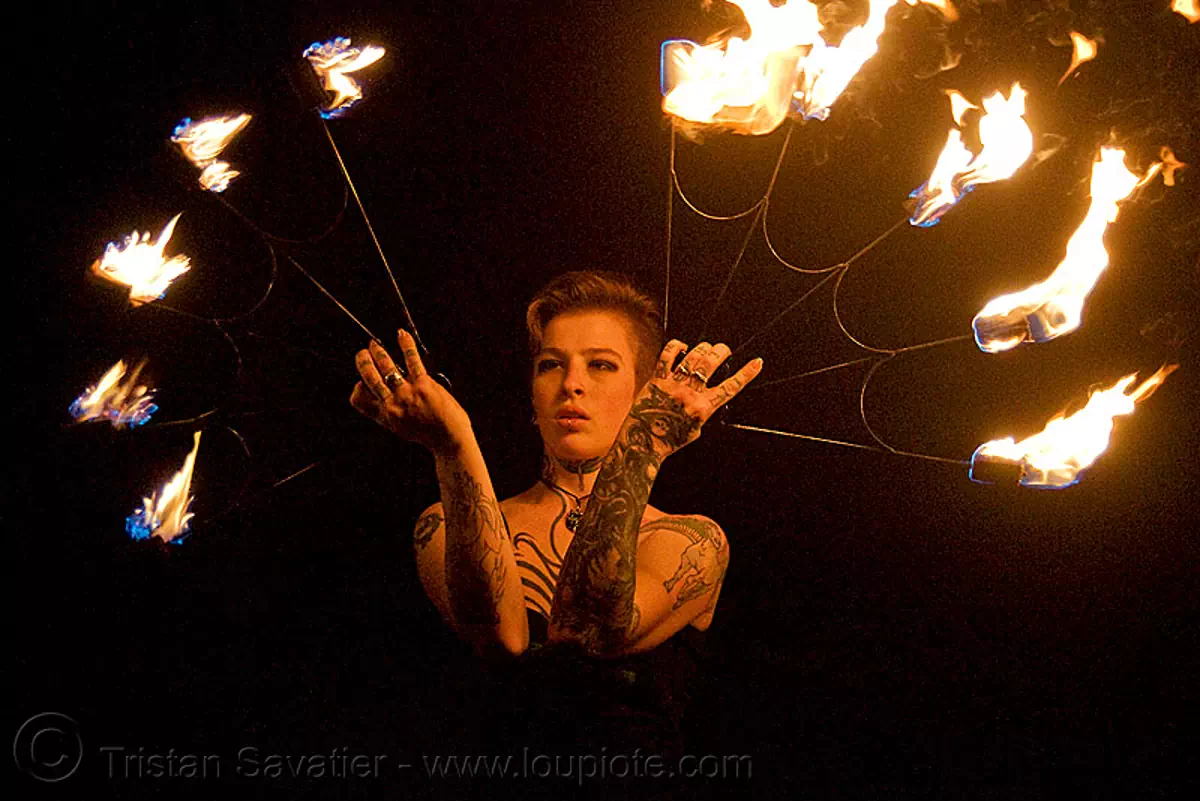 fire fans (san francisco) - fire dancer - leah, fire dancing, fire performer, fire spinning, flame, night, spinning fire, tattooed, tattoos, stock photo