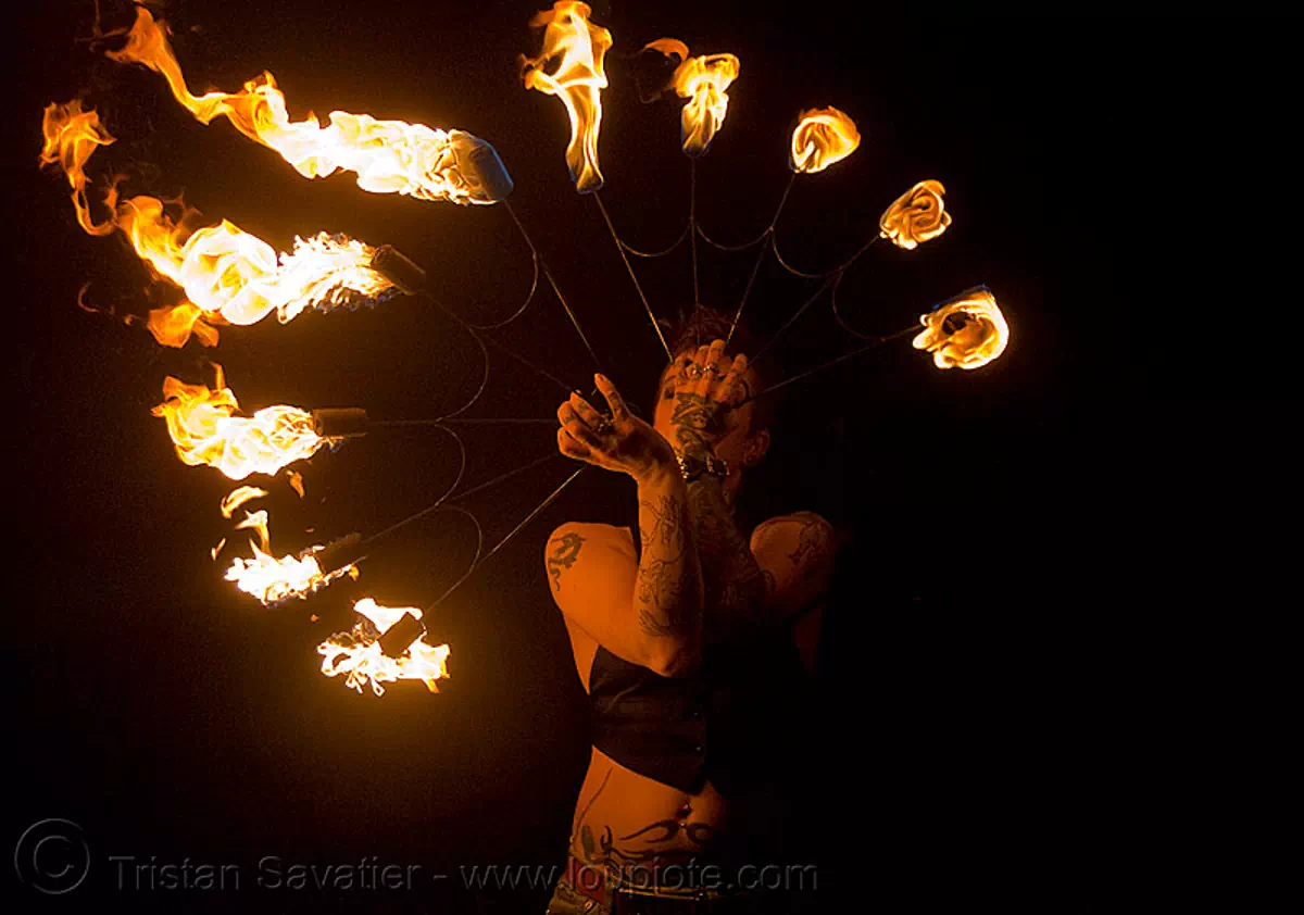 fire fans (san francisco) - fire dancer - leah, fire dancing, fire performer, fire spinning, flame, night, spinning fire, tattooed, tattoos, stock photo