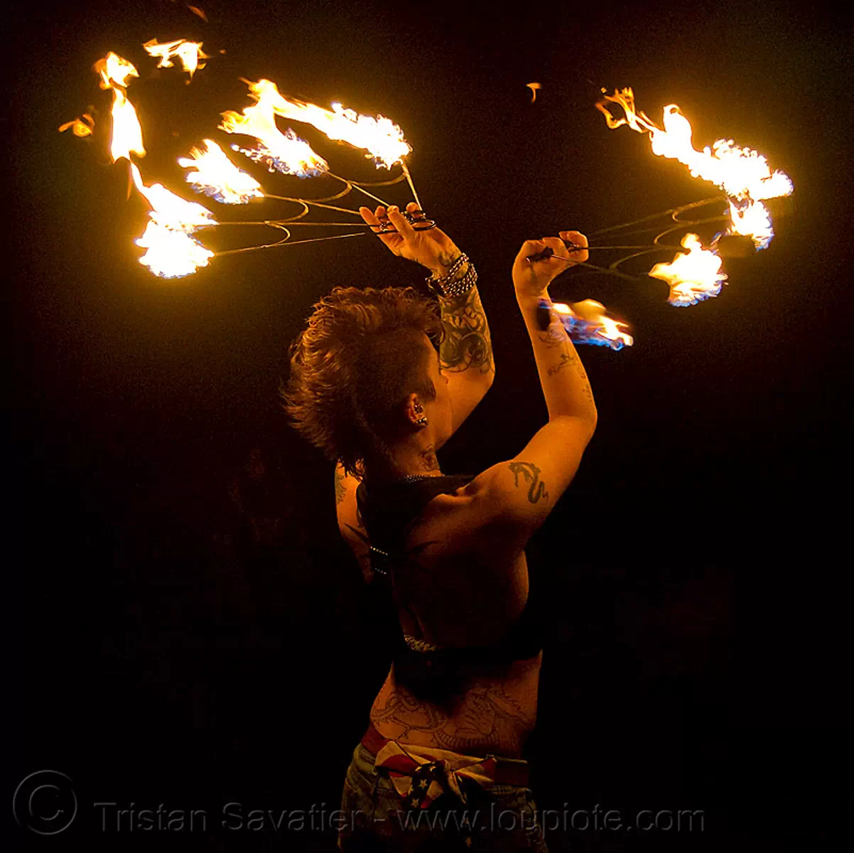 fire fans (san francisco) - fire dancer - leah, fire dancing, fire performer, fire spinning, flame, night, spinning fire, tattooed, tattoos, stock photo