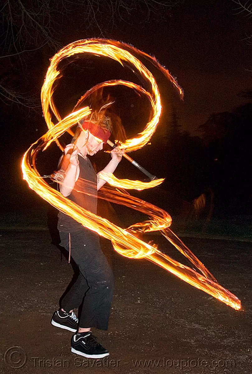 ro spinning fire staffs (san francisco), double staff, fire dancer, fire dancing, fire performer, fire spinning, fire staves, flame, long exposure, night, stock photo