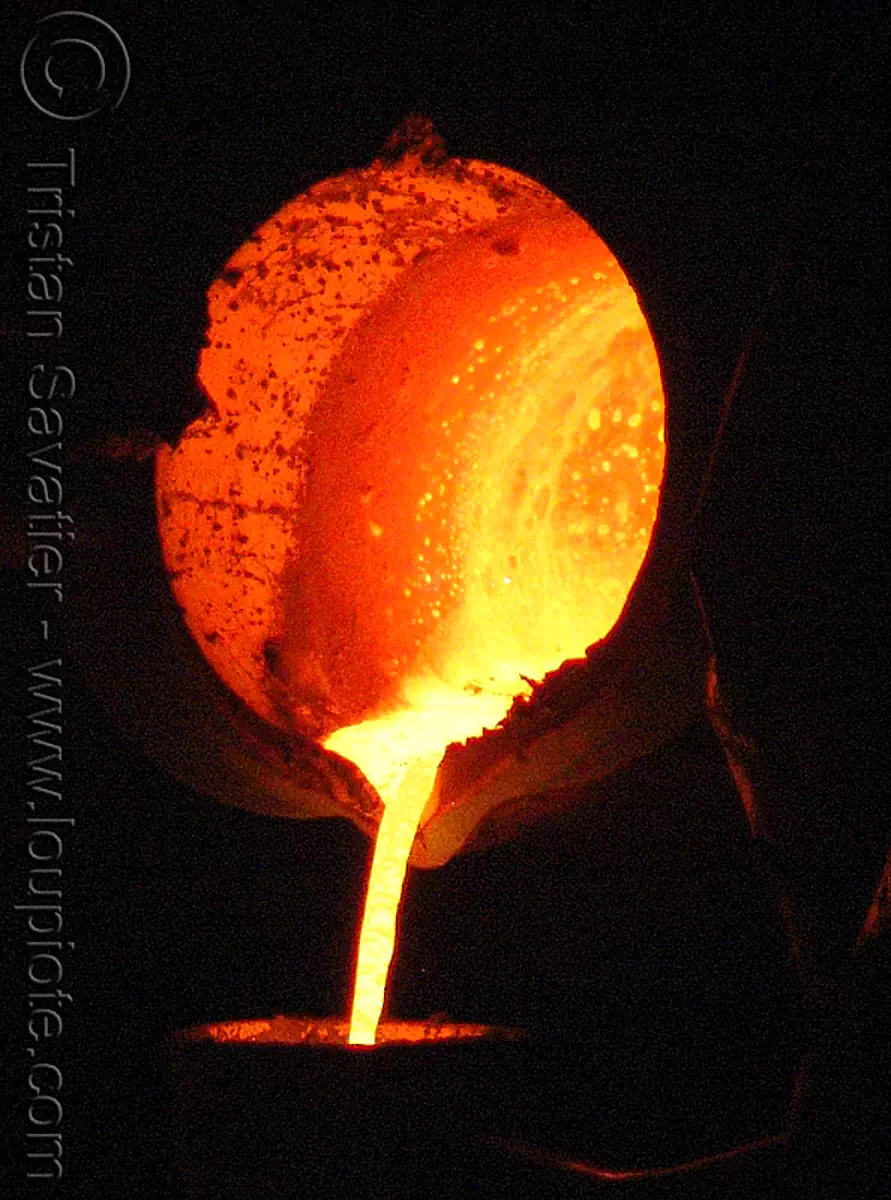 foundry - molten metal - crucible, low key, molten iron, stock photo