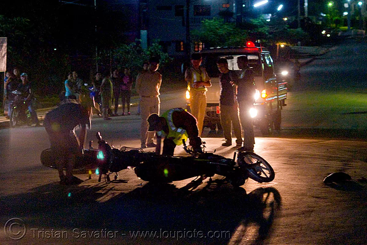 scooter accident - police (laos), backlight, collision, moto scooters, motorcycle accident, night, road crash, sam nua, street, traffic accident, traffic crash, xam nua, stock photo