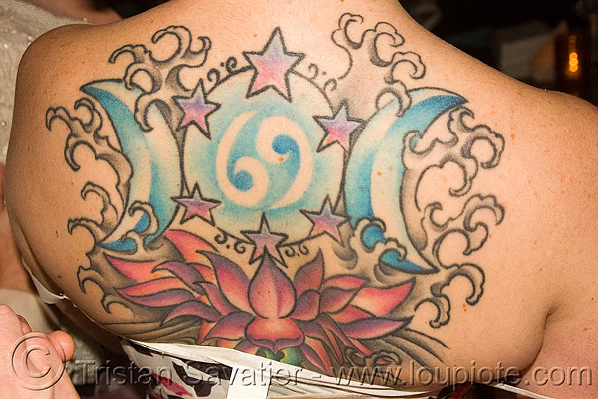 woman with back tattoo - brides of march (san francisco), 69, backpiece, festival, lotus flower tattoo, tattooed, stock photo