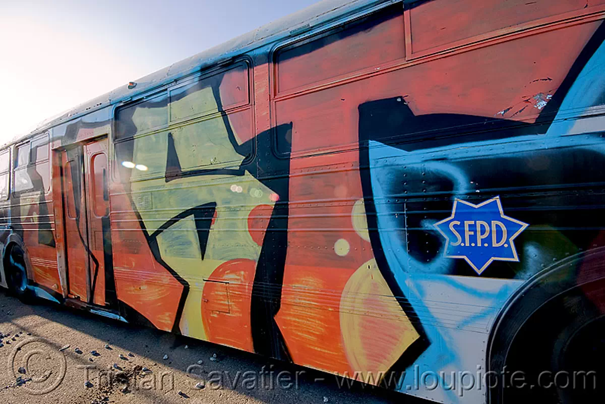 abandoned SFPD police bus with graffiti (san francisco), autobus, junkyard, no trespassing, san francisco police department, sfpd bus, stock photo