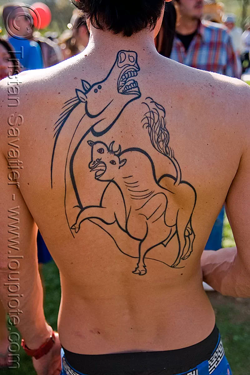 picasso backpiece tattoo, bull tattoo, cubism, guernica, horse tattoo, man, tattooed, stock photo