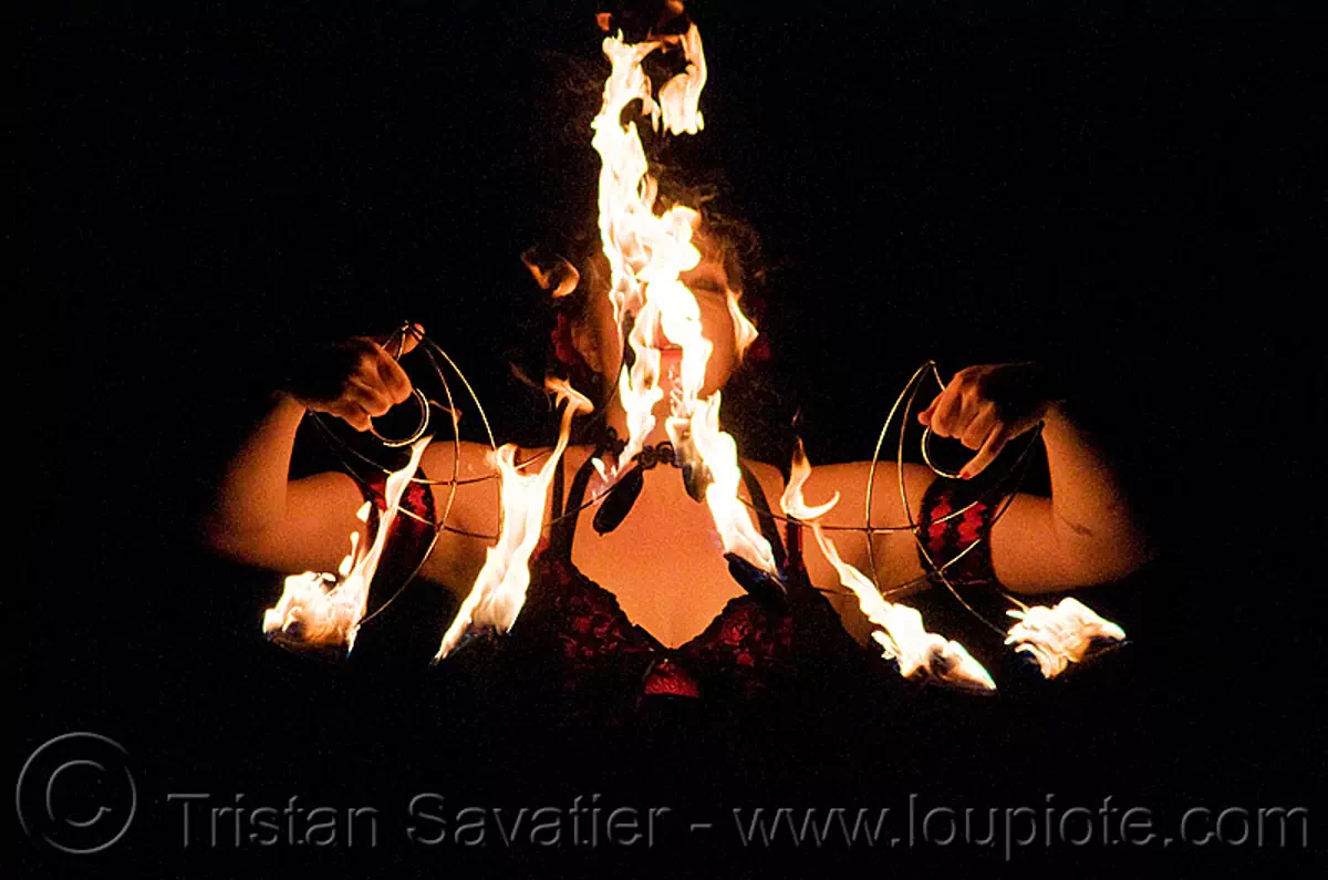 memory with fire fans - fire performer - temple of poi 2009 fire dancing expo - union square (san francisco), fire dancer, fire spinning, flame, lena, night, pyrotation, spinning fire, stock photo