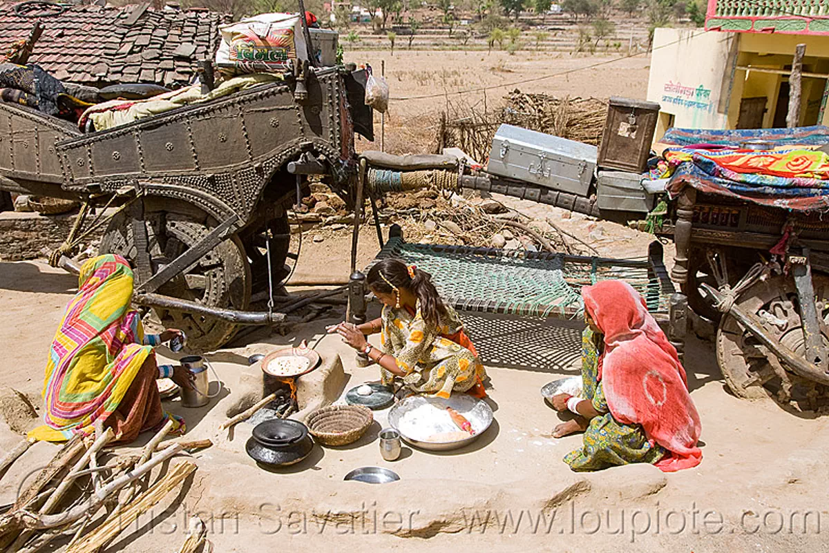 gaduliya lohars nomadic tribe, bullock cart, camp, chariot, encampment, gadia lohars, gipsies, gypsies, horse cart, nomads, ox cart, road, thiya, udaipur, stock photo