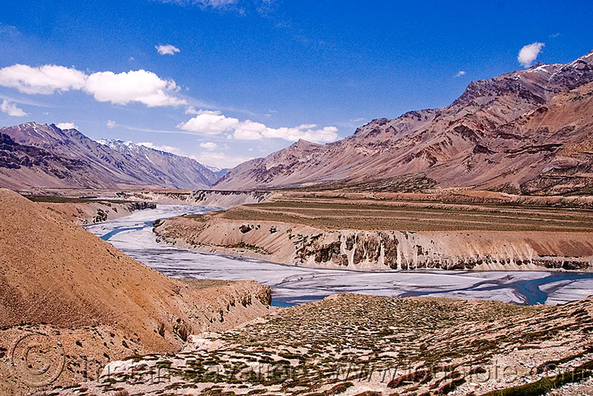 valley between sarchu and lachulung pass - manali to leh road (india), ladakh, mountains, river bed, stock photo