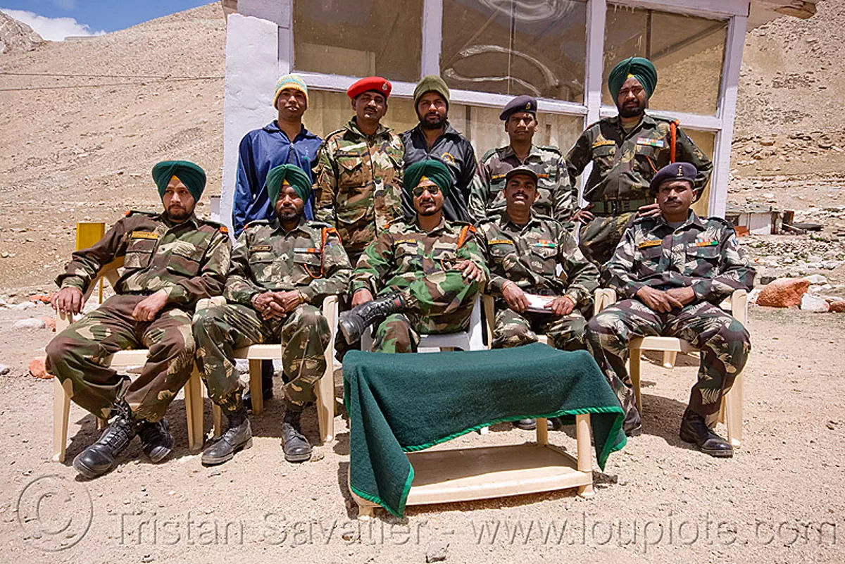 sikh soldiers at army check-point - road to chang-la pass - ladakh (india), army fatigue, army uniform, chang pass, indian army, men, military, sikhism, sikhs, sitting, stock photo