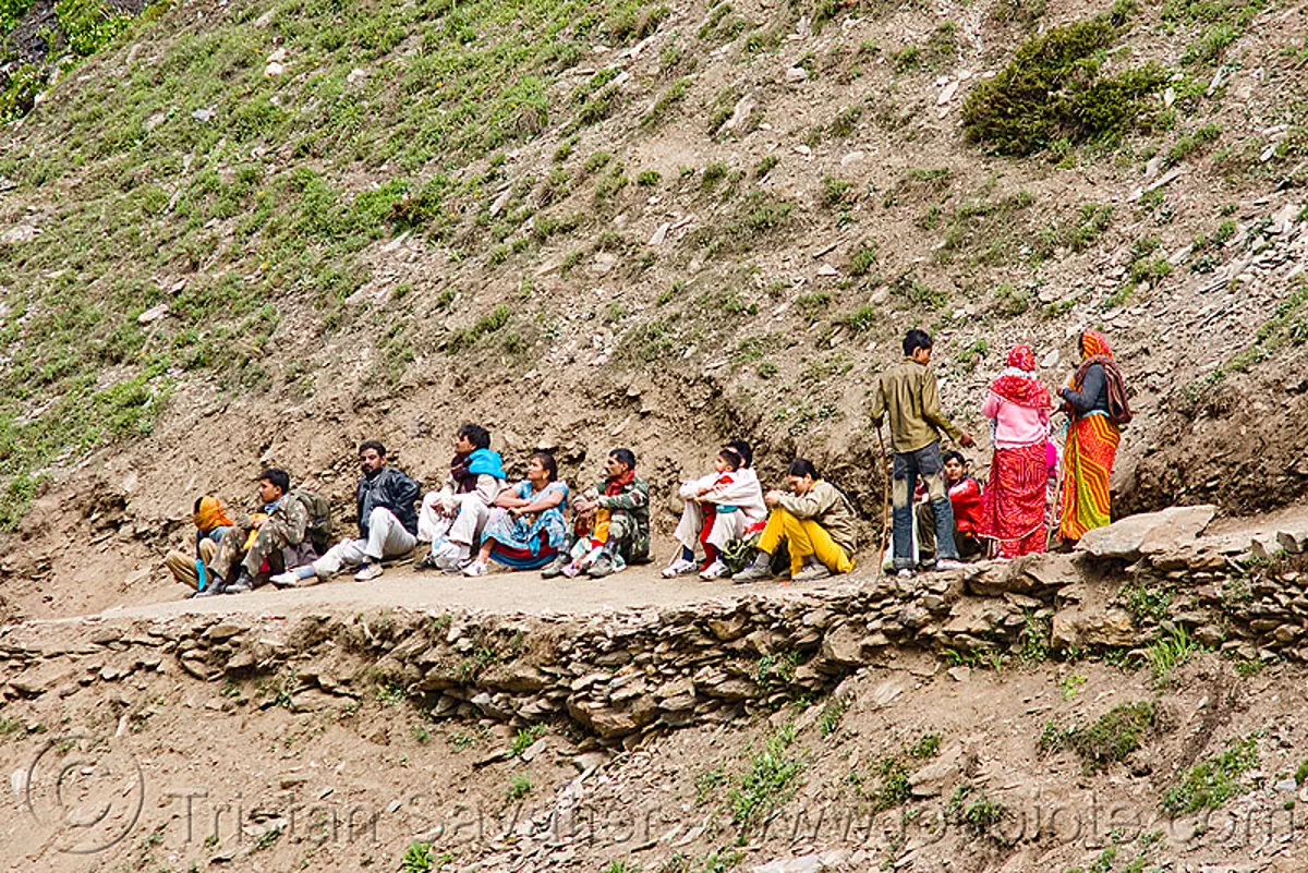 pilgrims resting on trail - amarnath yatra (pilgrimage) - kashmir, amarnath cave, mountain trail, mountains, trekking, yatris, अमरनाथ गुफा, stock photo