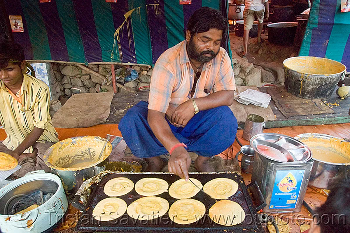 cooking pancakes, langar (free community kitchen), amarnath yatra