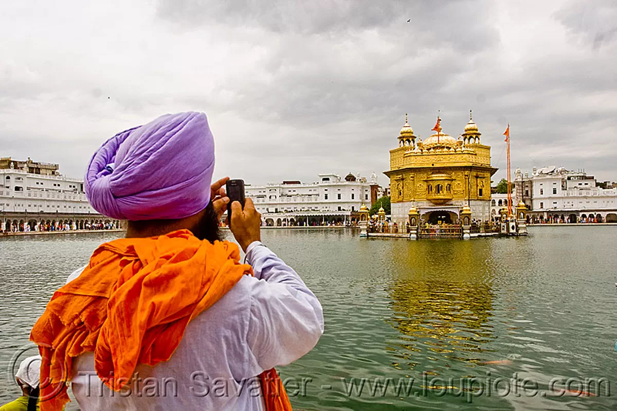 golden temple - sikh - amritsar (india), camera phone, cellphone, gurdwara, man, panjab, penjab, photographer, punjab, sikhism, tourist, stock photo