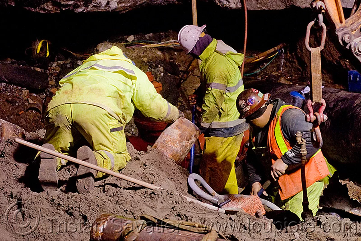 utility workers fixing broken water main, san francisco
