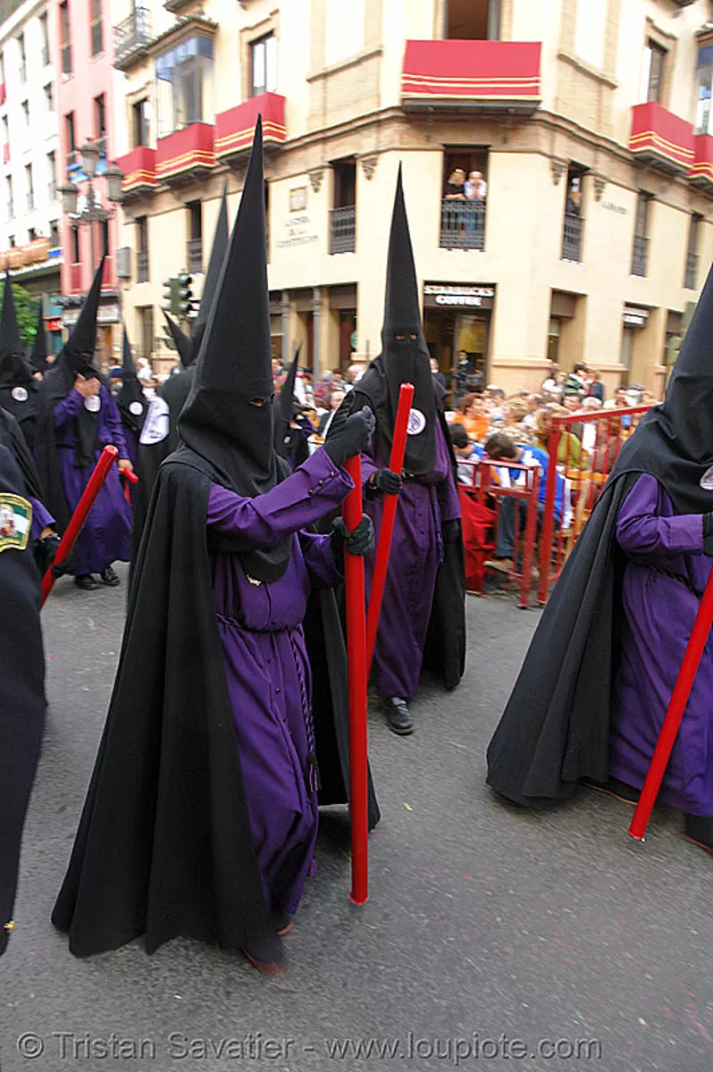 hermandad de san bernardo - red candles - semana santa en sevilla, andaluc&iacute;a, capirotes, cofrad&iacute;a, easter, espa&ntilde;a, nazarenos, parade, procesi&oacute;n, procession, religion, spain, stock photo
