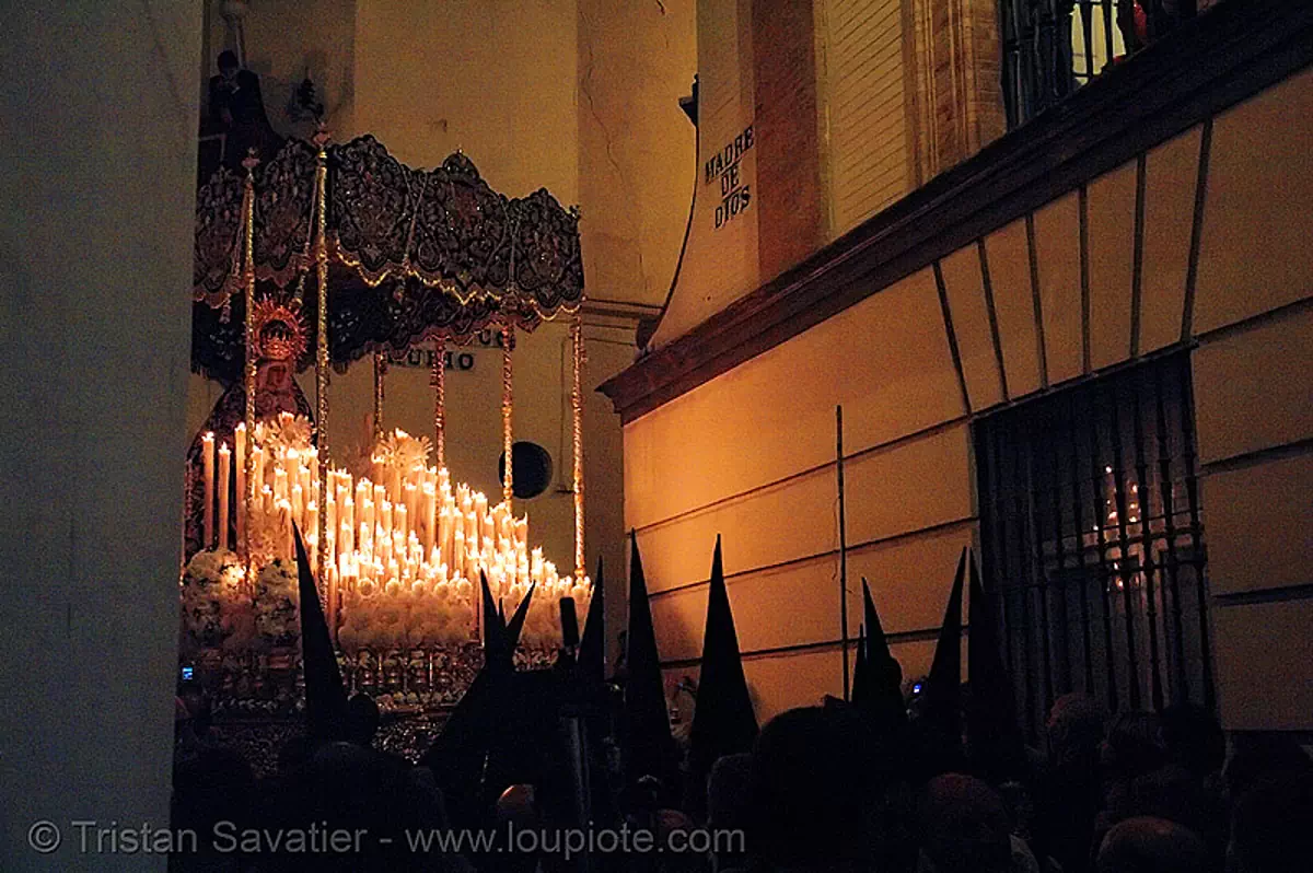 hermandad de san bernardo - semana santa en sevilla, andaluc&iacute;a, candles, capirotes, cofrad&iacute;a, easter, espa&ntilde;a, mar&iacute;a sant&iacute;sima del refugio, nazarenos, night, parade, paso de la virgen, procesi&oacute;n, procession, religion, spain, virgin mary, stock photo