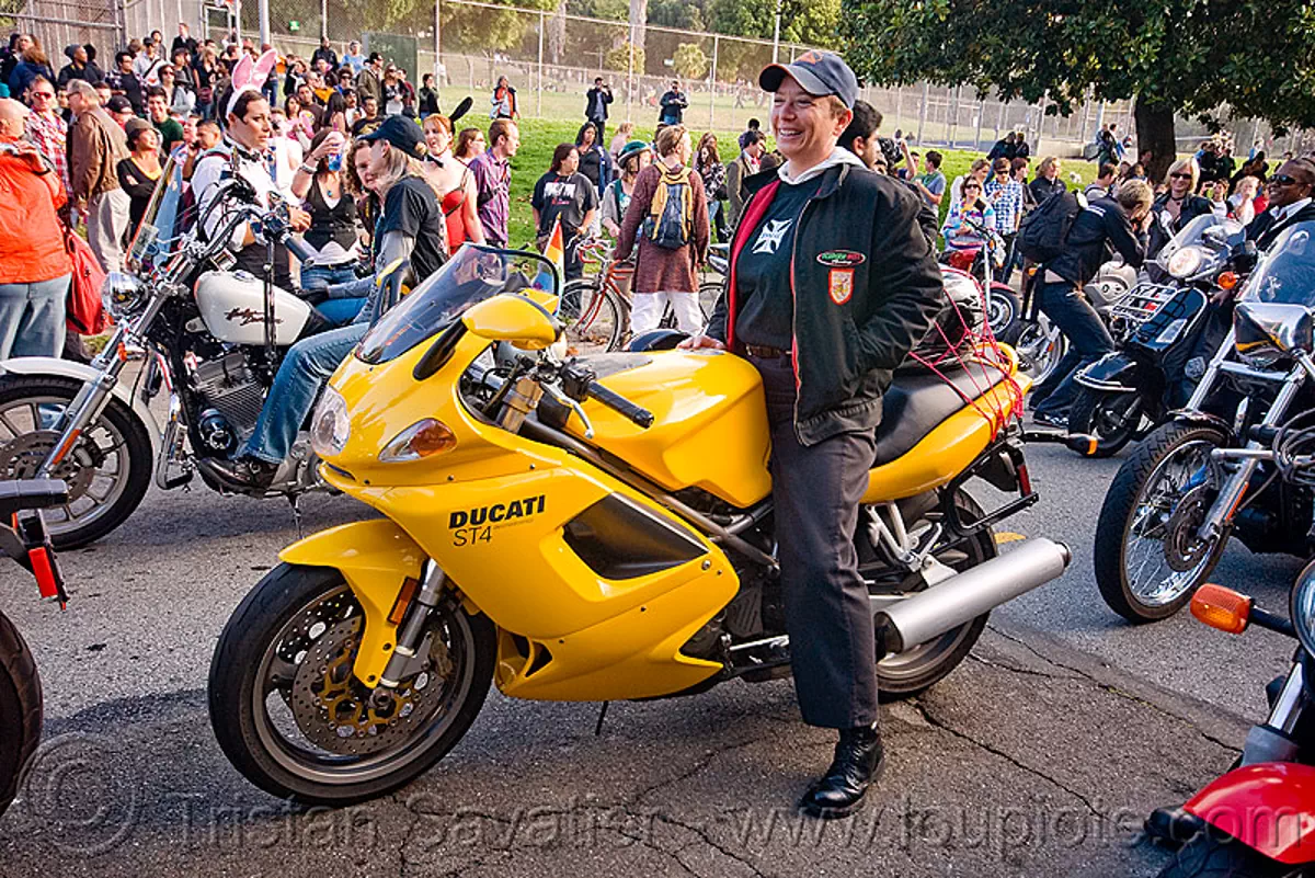 yellow ducati ST4 motorcycle, dolores park, dykes on bikes, gay pride festival, motorbike, parade, stock photo