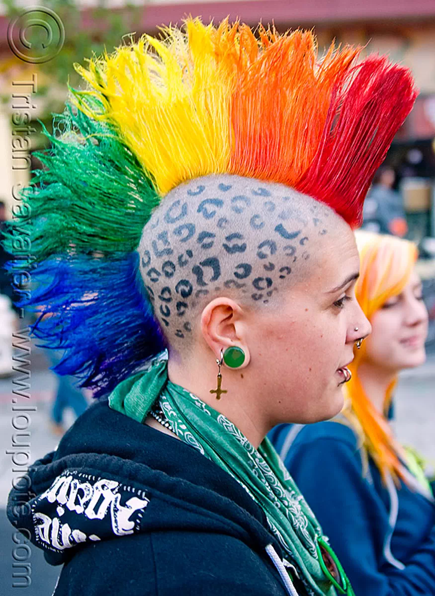 rainbow mohawk, ear piercing, gauged ears, gay pride festival, head tattoo, jessi, lip piercing, mohawk hair, panther tattoo, rainbow colors, rainbow hair, scalp tattoo, stretched earlobes, tattooed, stock photo